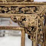 Miroir a pare closes de style Louis XIV en bois et stuc doré XIX siècle