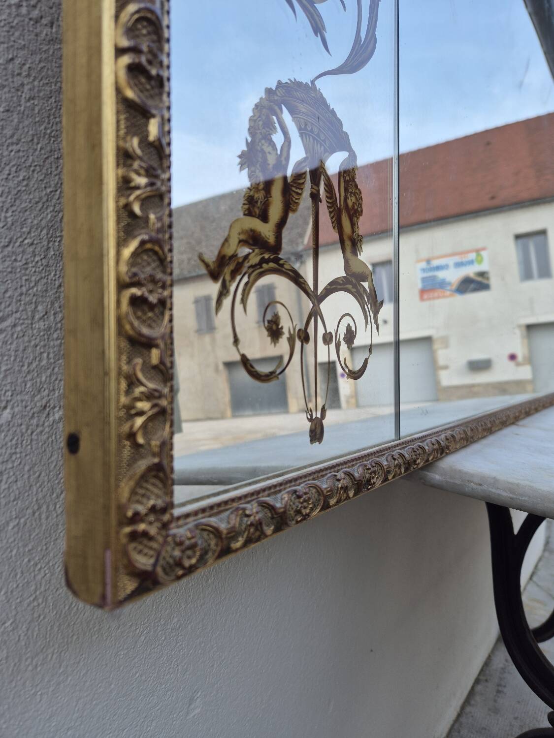 Antique gilded Venetian brasserie mirror in eglomised glass