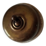 Antique brass and porcelain switch from the 40s/50s