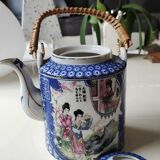 Japanese-inspired porcelain teapot.otifs Geishas kimonos, cherry blossoms