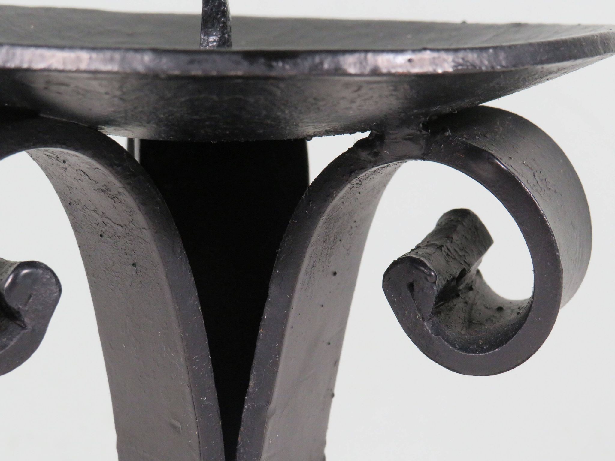 Vintage wrought iron chandelier for large candle.