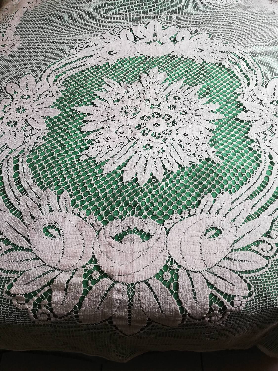Bedspread, vintage crochet, openwork flowers, square stitches.