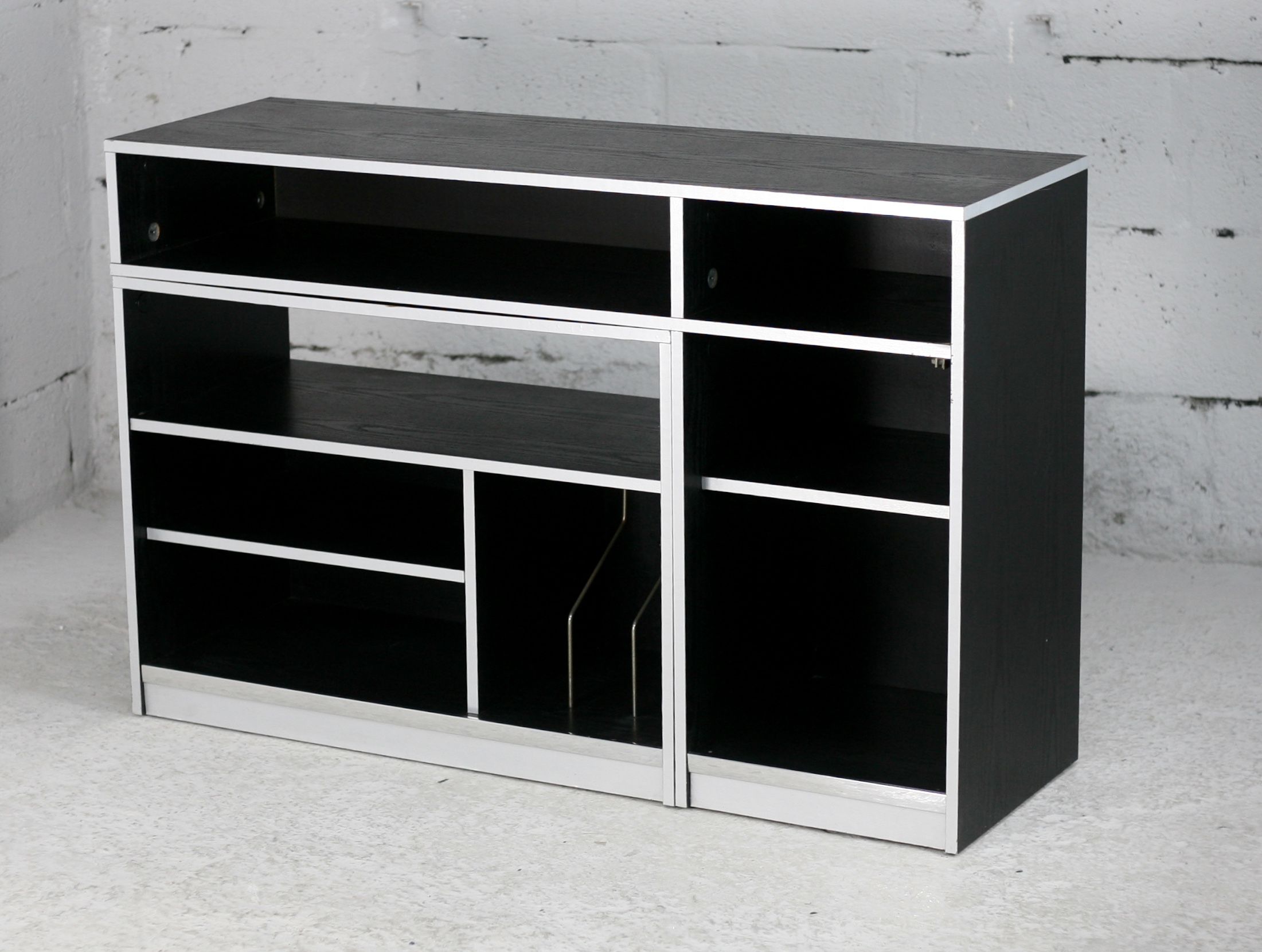 Storage cabinet wood compressed lacquered black lining margins aluminum. France, circa 1975.