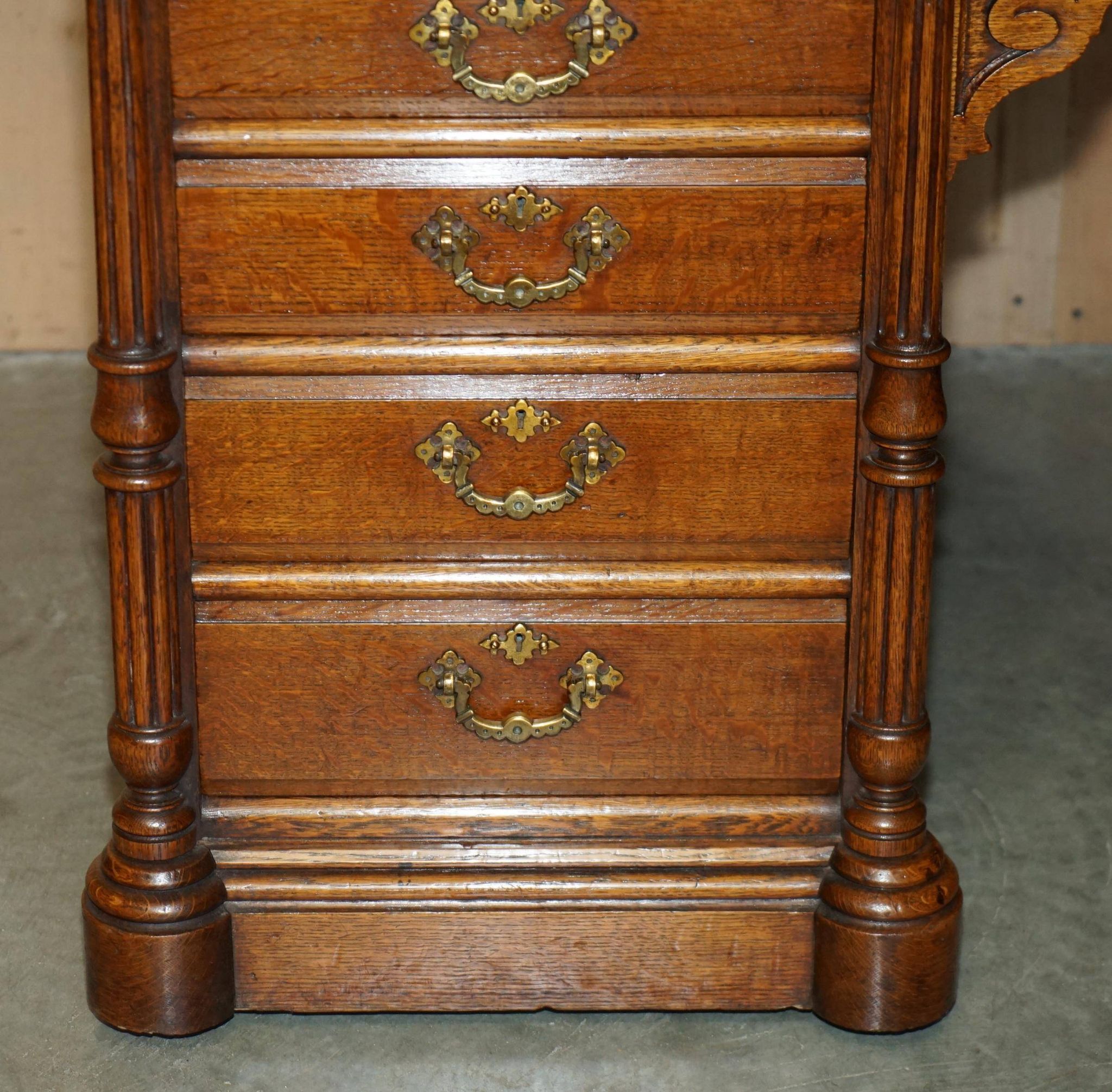 Antique double-sided desk C Hindley & Son in oak and leather