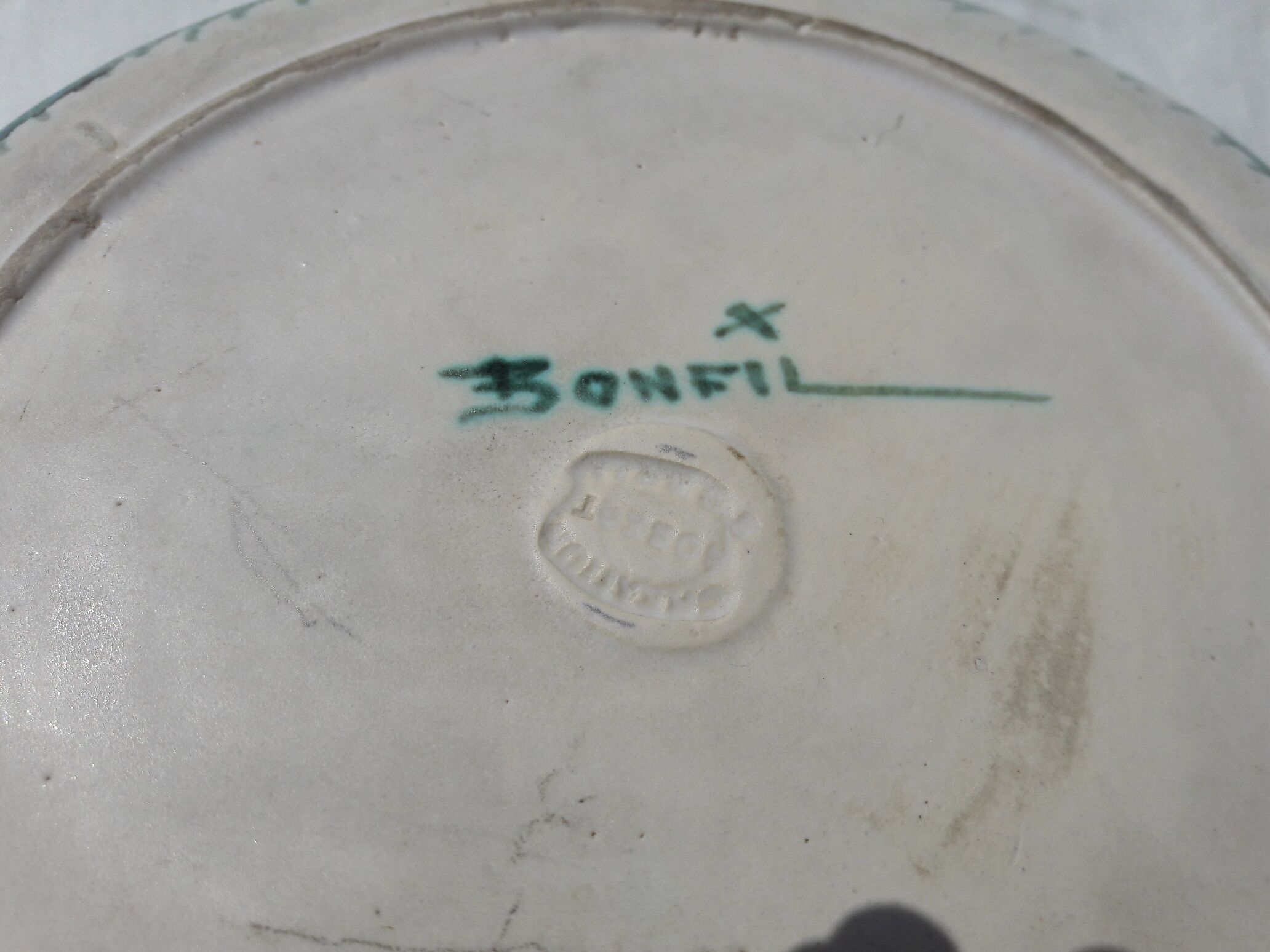 Ceramic ashtray signed