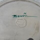 Ceramic ashtray signed