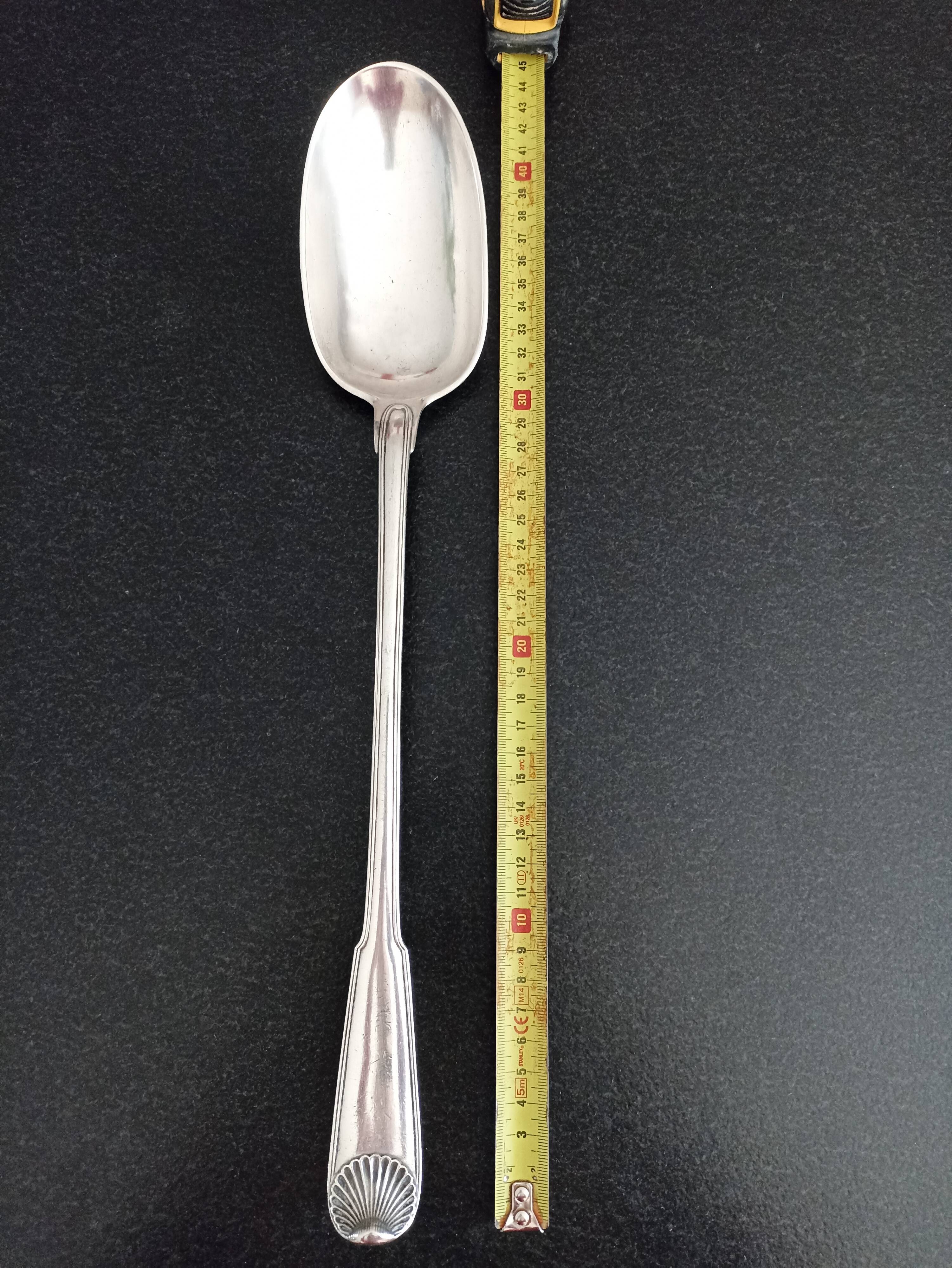 Silver metal serving spoon