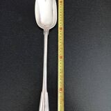 Silver metal serving spoon