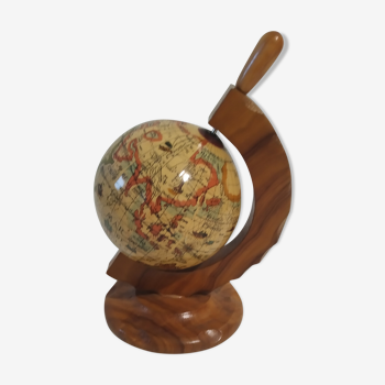 Small globe supporting olive wood