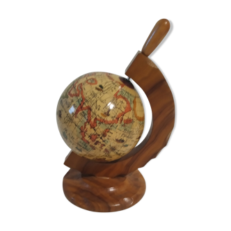 Small globe supporting olive wood