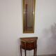 Hallway mirror, gilded frame, curtains and fleur-de-lis