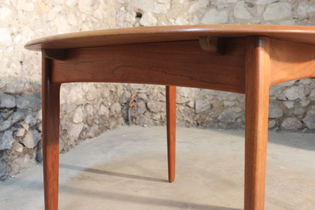 Scandinavian vintage teak dining table with 2 extension cords hidden by Svend Aage Madsen for Knudsen - Son, Denmark