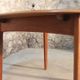 Scandinavian vintage teak dining table with 2 extension cords hidden by Svend Aage Madsen for Knudsen - Son, Denmark