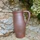 Brown stoneware jug
