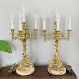 Pair of gilded bronze candlesticks, marble bases.