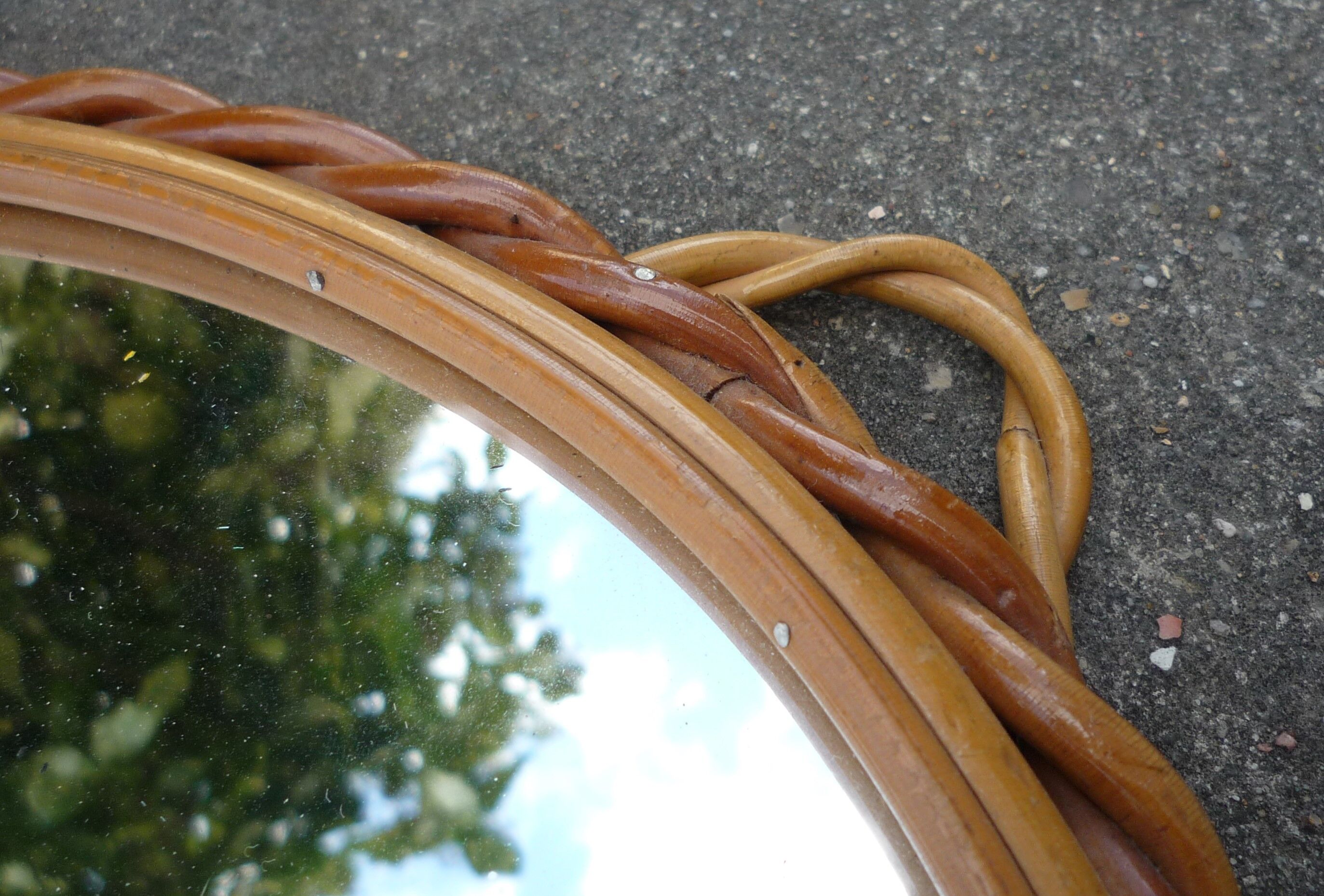 Small round mirror with rattan frame, vintage 70s