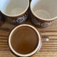 Vintage coffee service in brown stoneware from the 1970s.