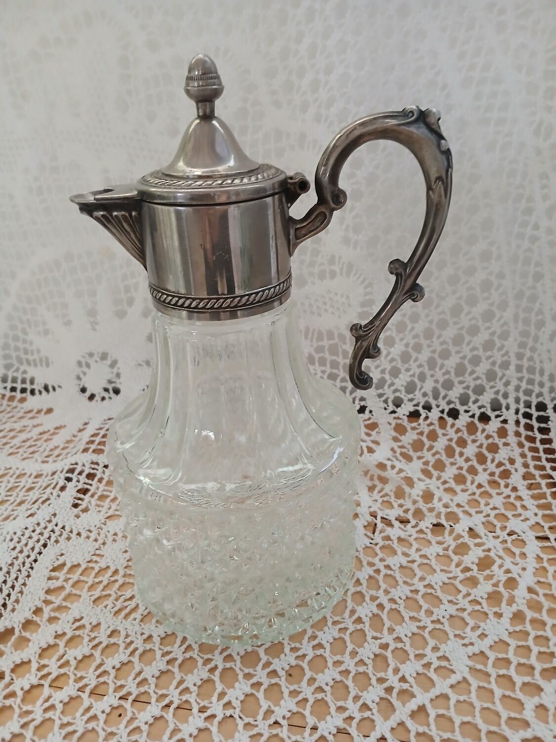 Antique pewter and glass carafe