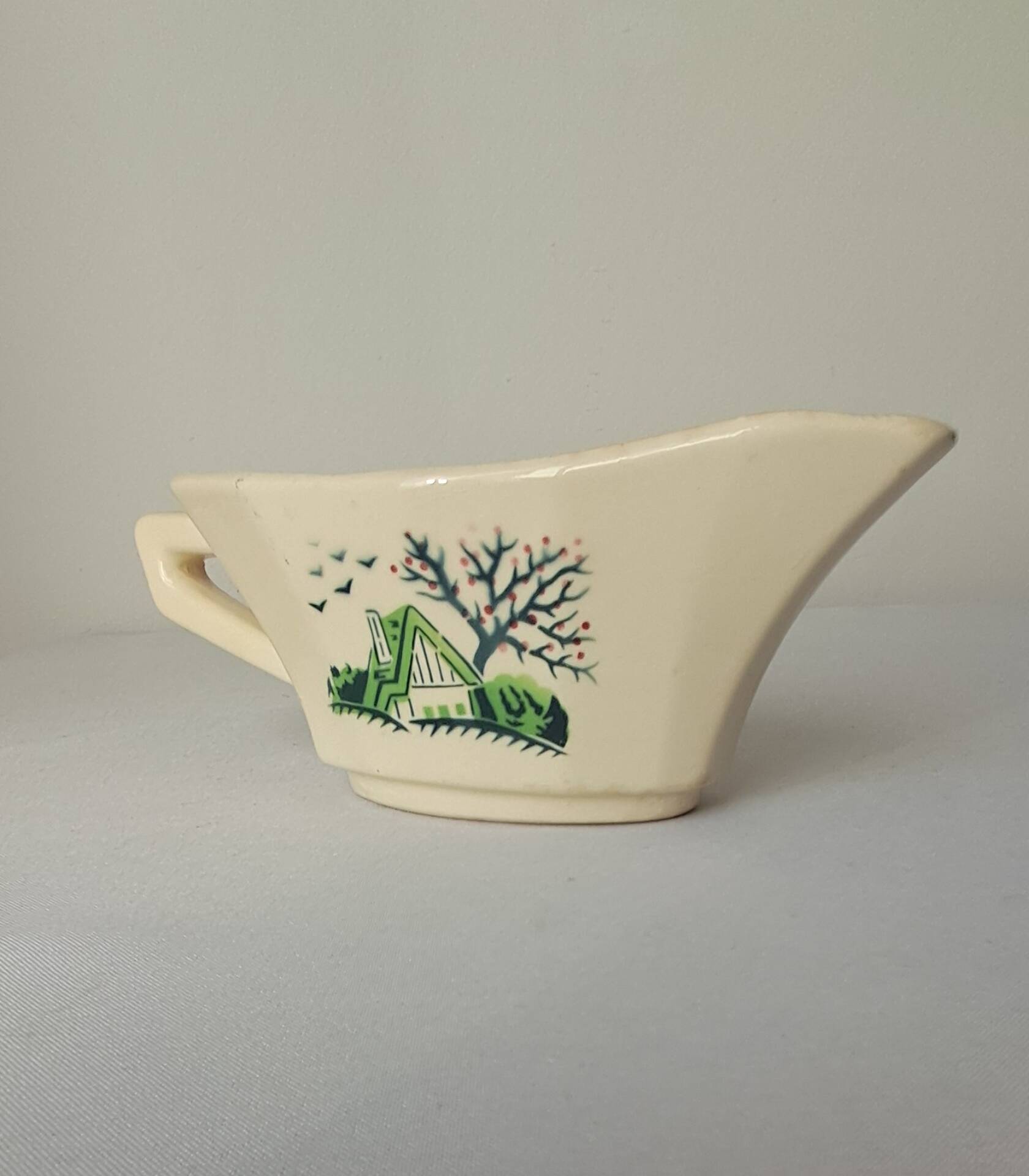 Bayeux model sauce boat from Digoin Sarreguemines. Vintage.