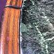 Vintage green sea marble and rosewood table from the 1970s.
