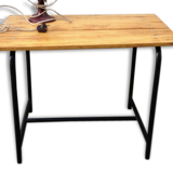 Small table low metal tubular base.