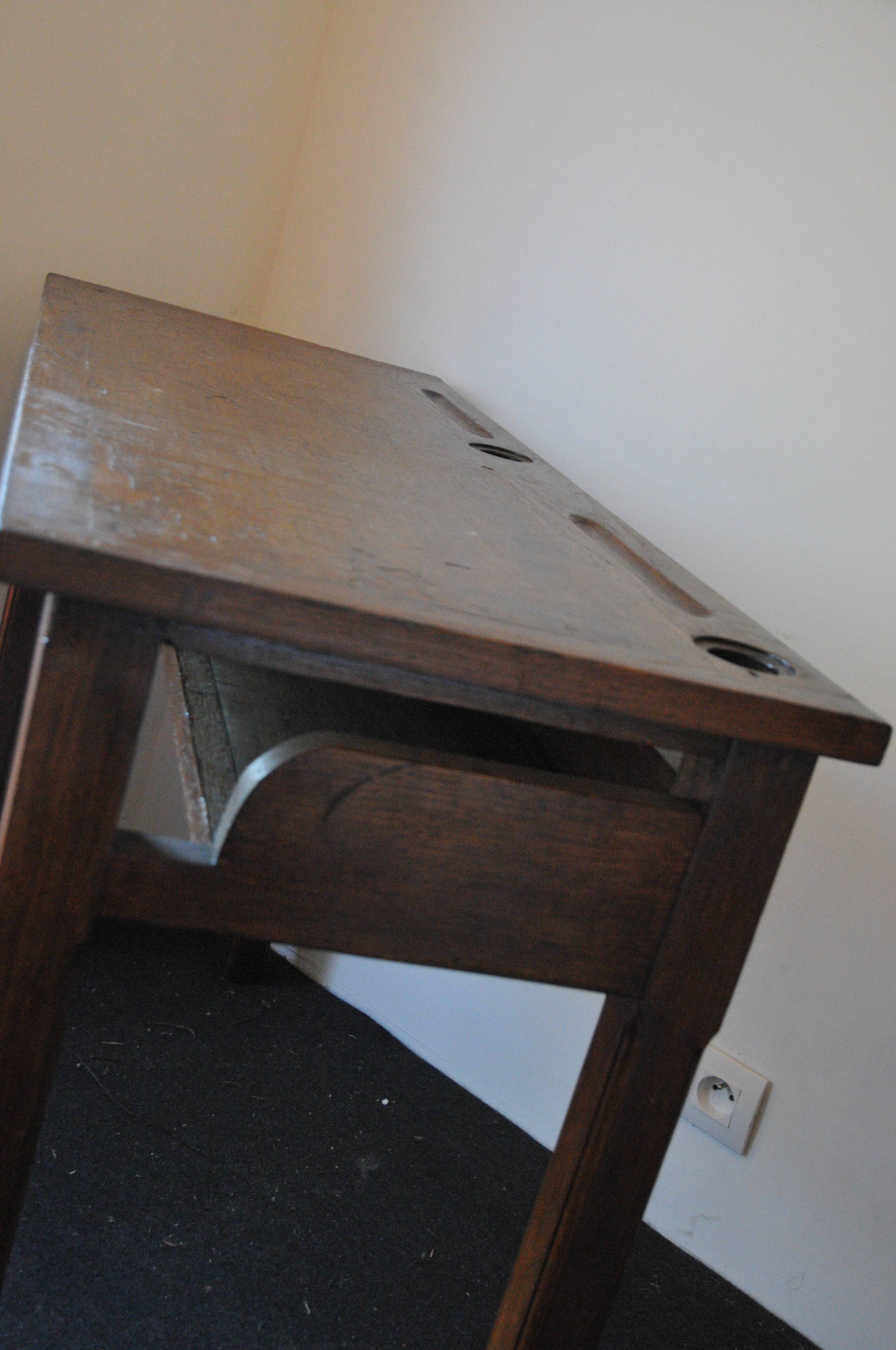 School desk with porcelain inkwells