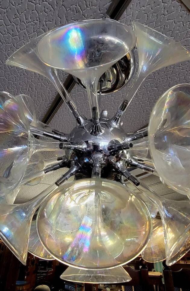 According to Goffredo Reggiani: trumpet chandelier or champagne flute