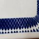 Vintage old trivet Badonviller blue graphic pattern