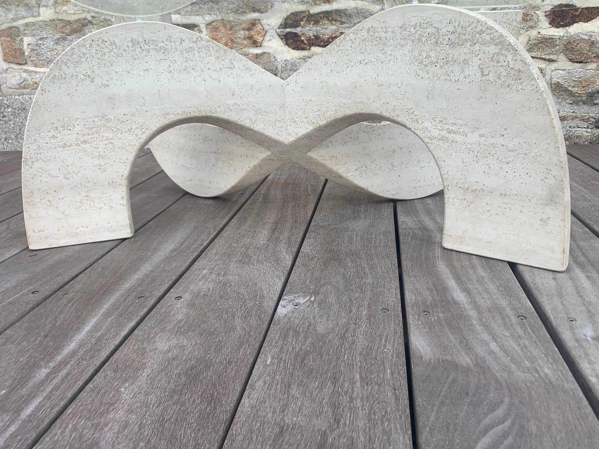 Trendy coffee table in glass and travertine