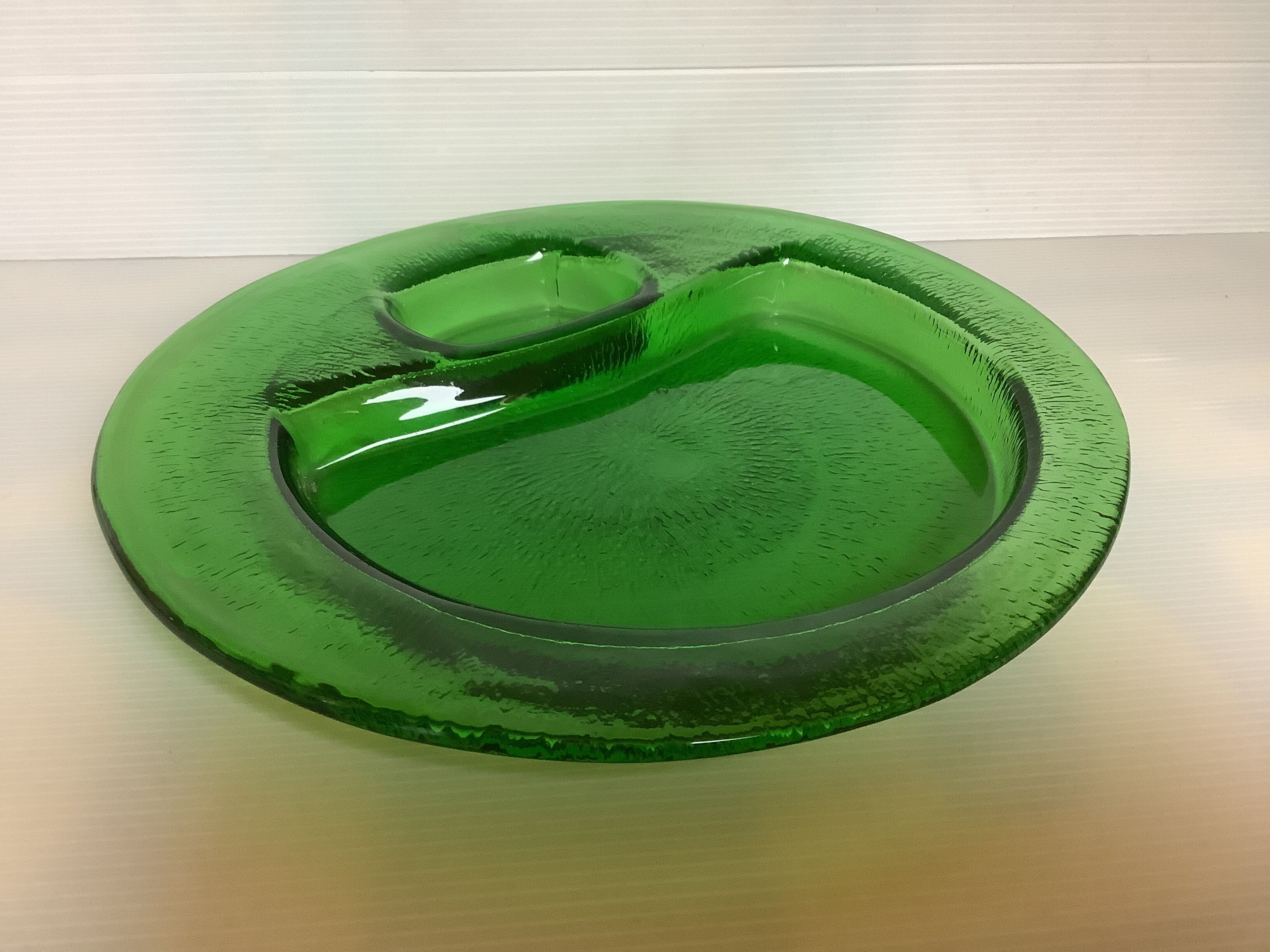 Handcrafted thick green glass empty pocket