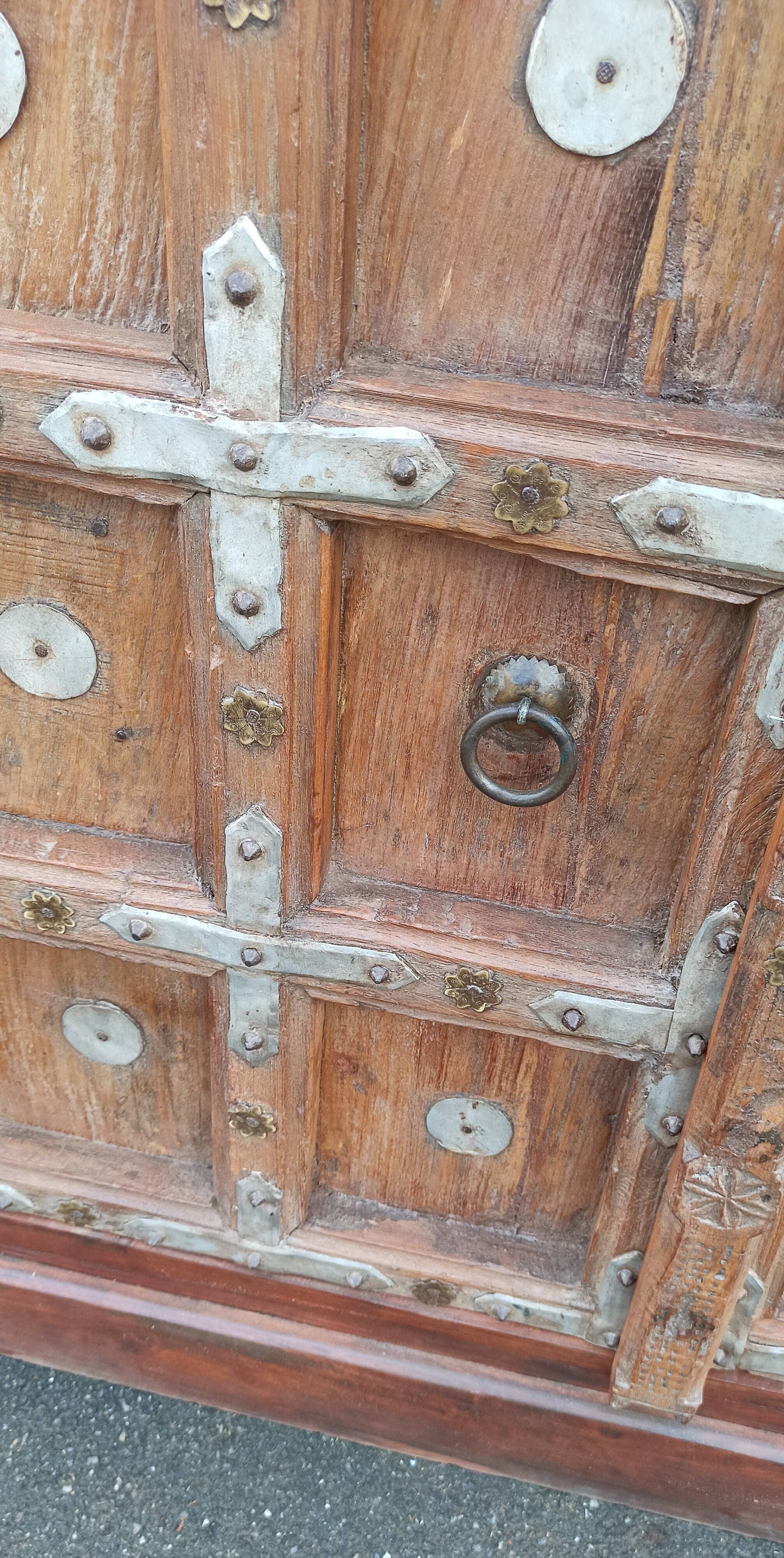 Small old wooden sideboard with two doors