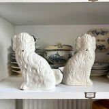 Pair of black Cavalier King Charles dogs in Staffordshire pottery, 19th century.