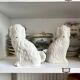 Pair of black Cavalier King Charles dogs in Staffordshire pottery, 19th century.