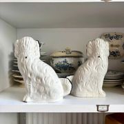 Pair of black Cavalier King Charles dogs in Staffordshire pottery, 19th century.