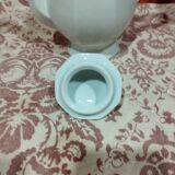 old coffee maker in white earthenware and red edging