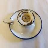 Cellar rat in old enamelled sheet metal