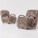 Paire de fauteuils scandinaves en peau de mouton à poils longs, années 1950