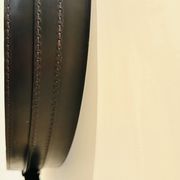 Jacques Adnet circular leather and brass mirror