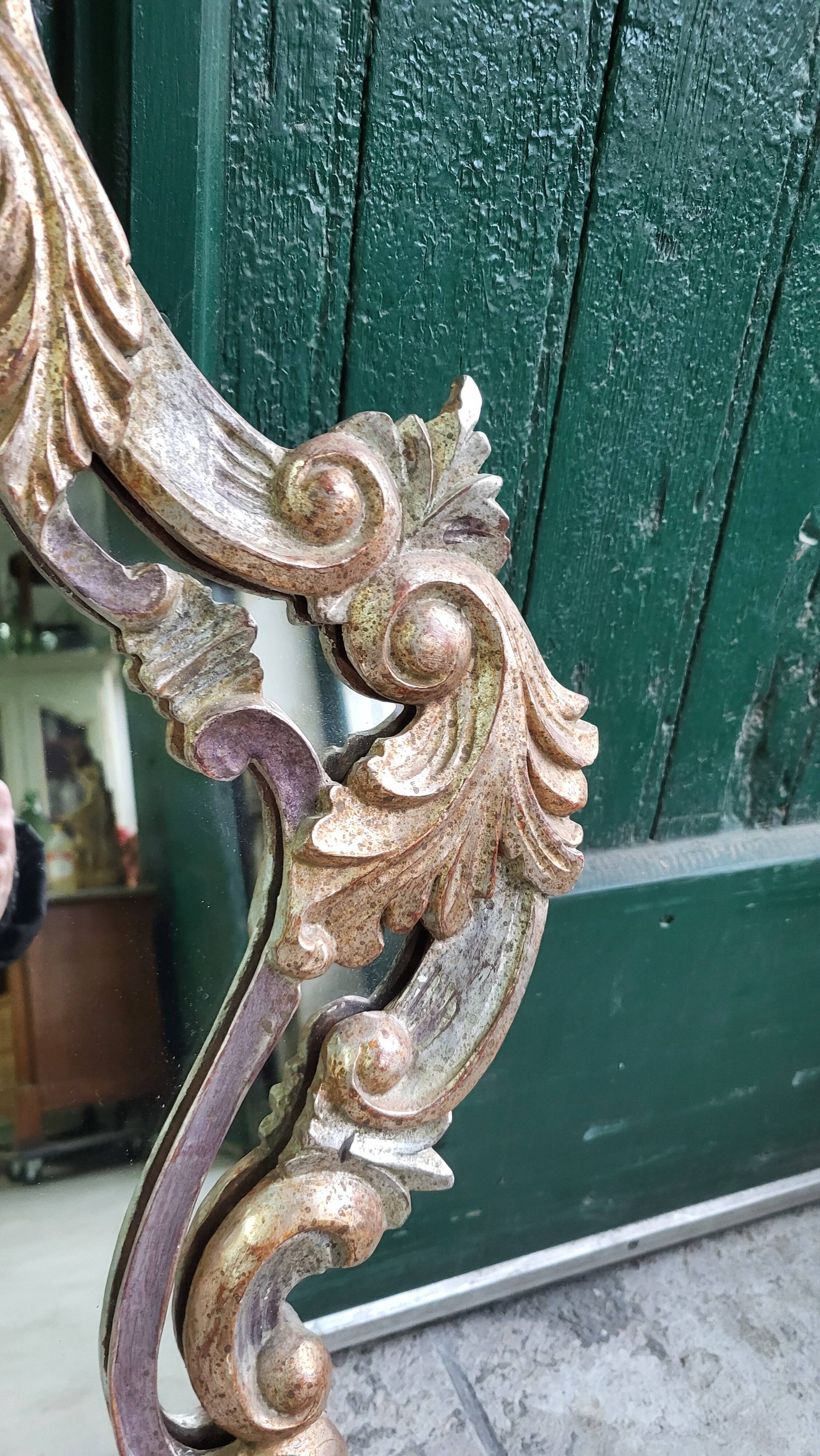 MIRROR IN LOUIS XV STYLE WITH GILDING AND SILVERING