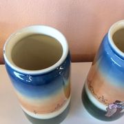 Pair of enamelled sandstone vases