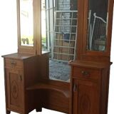 Old dressing table with triple mirror.