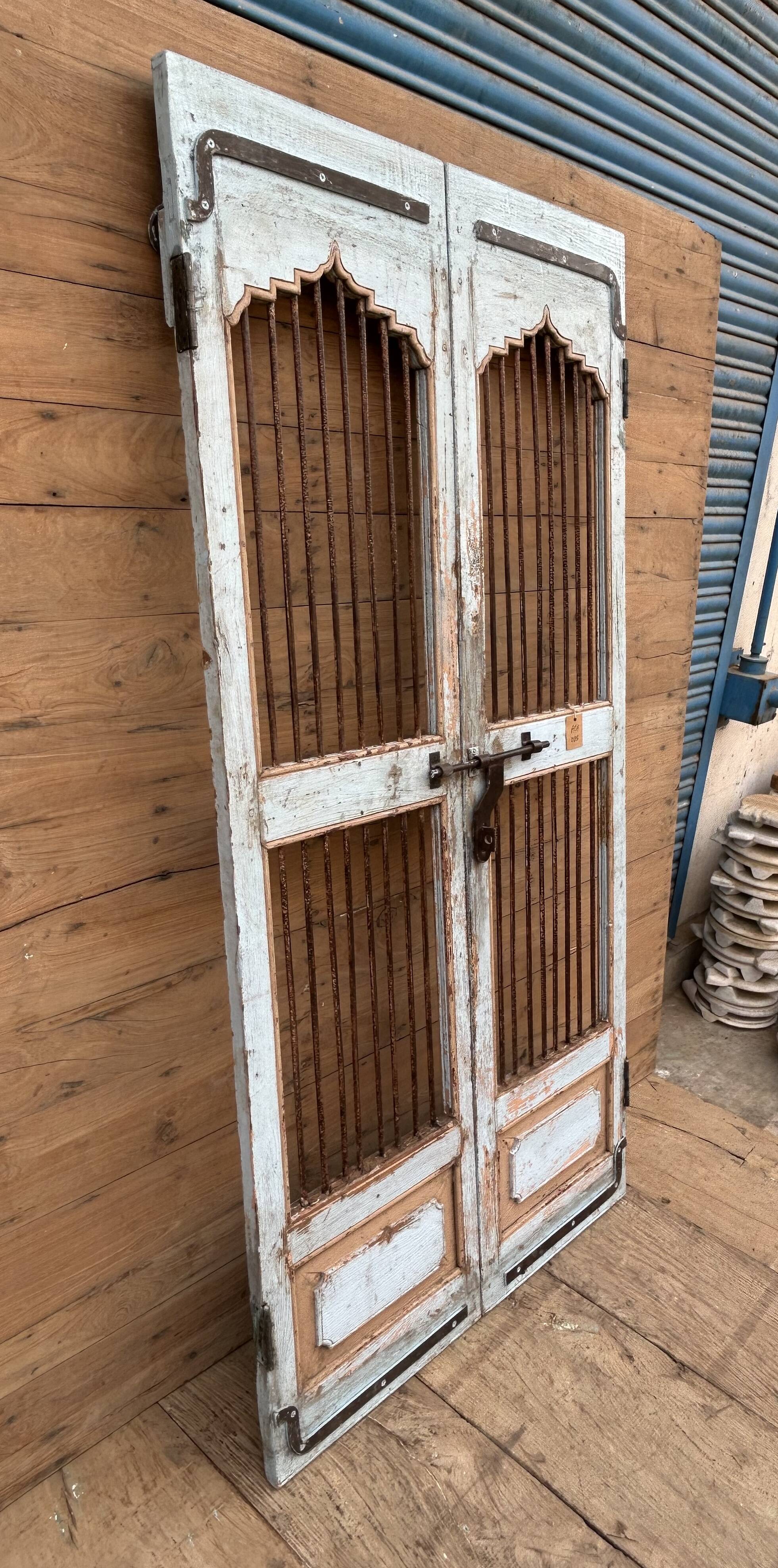 Art Deco patio door in Burmese teak with original patina.