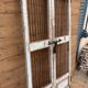 Art Deco patio door in Burmese teak with original patina.