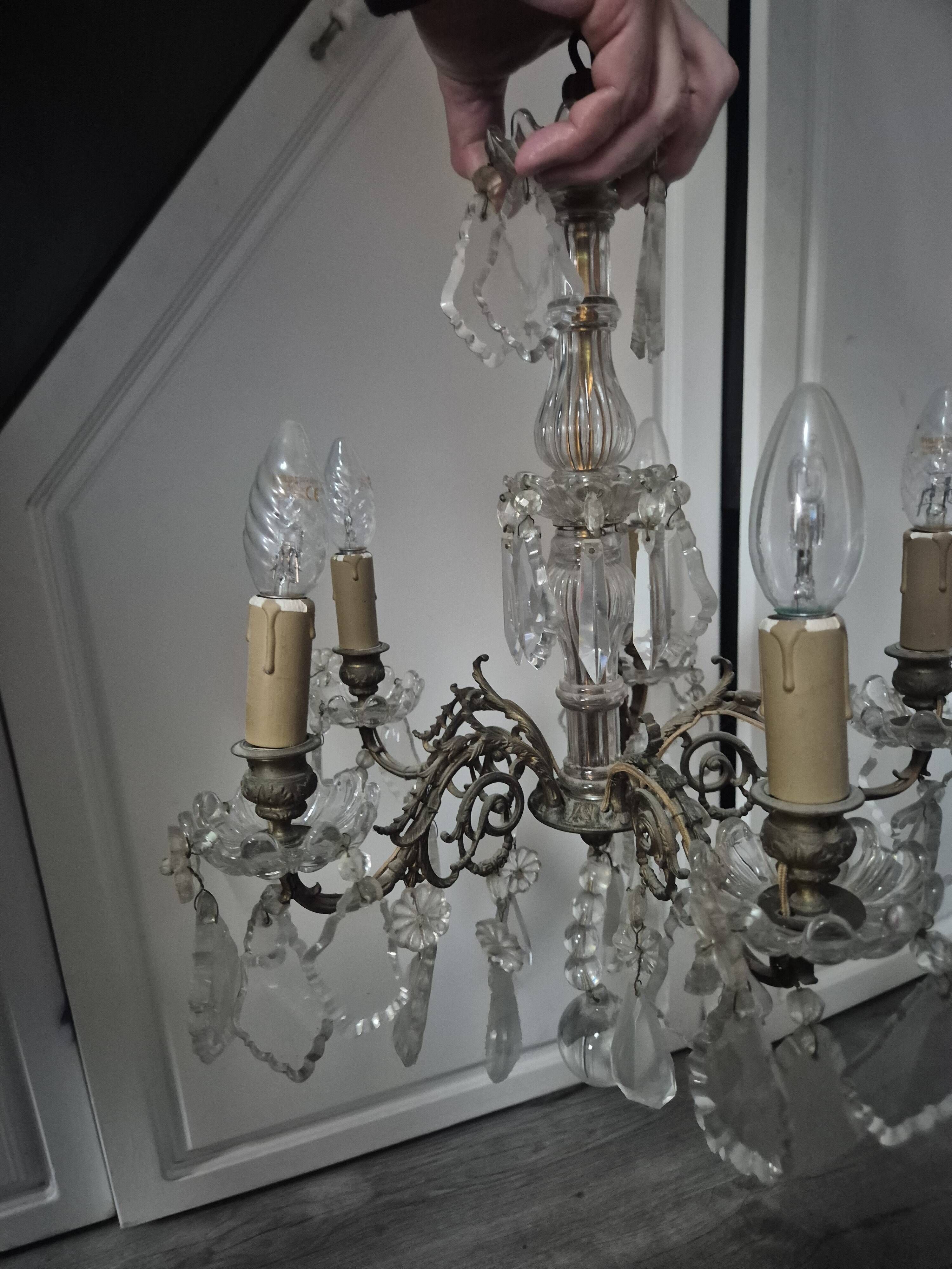 vintage pendant light from the 60s 70s with glass pendants and 5 candle holders