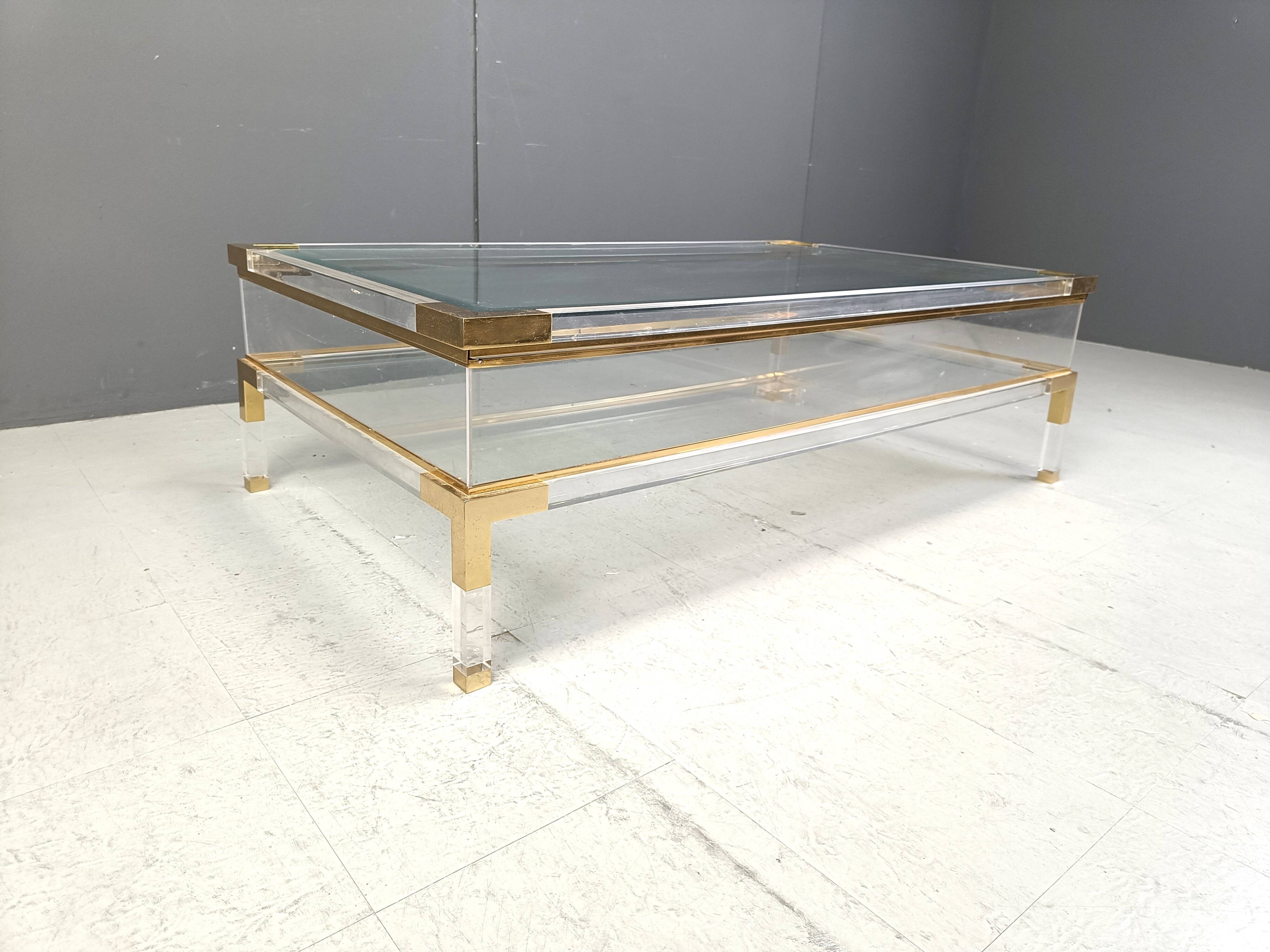 Vintage lucite and brass sliding top coffee table, 1970s