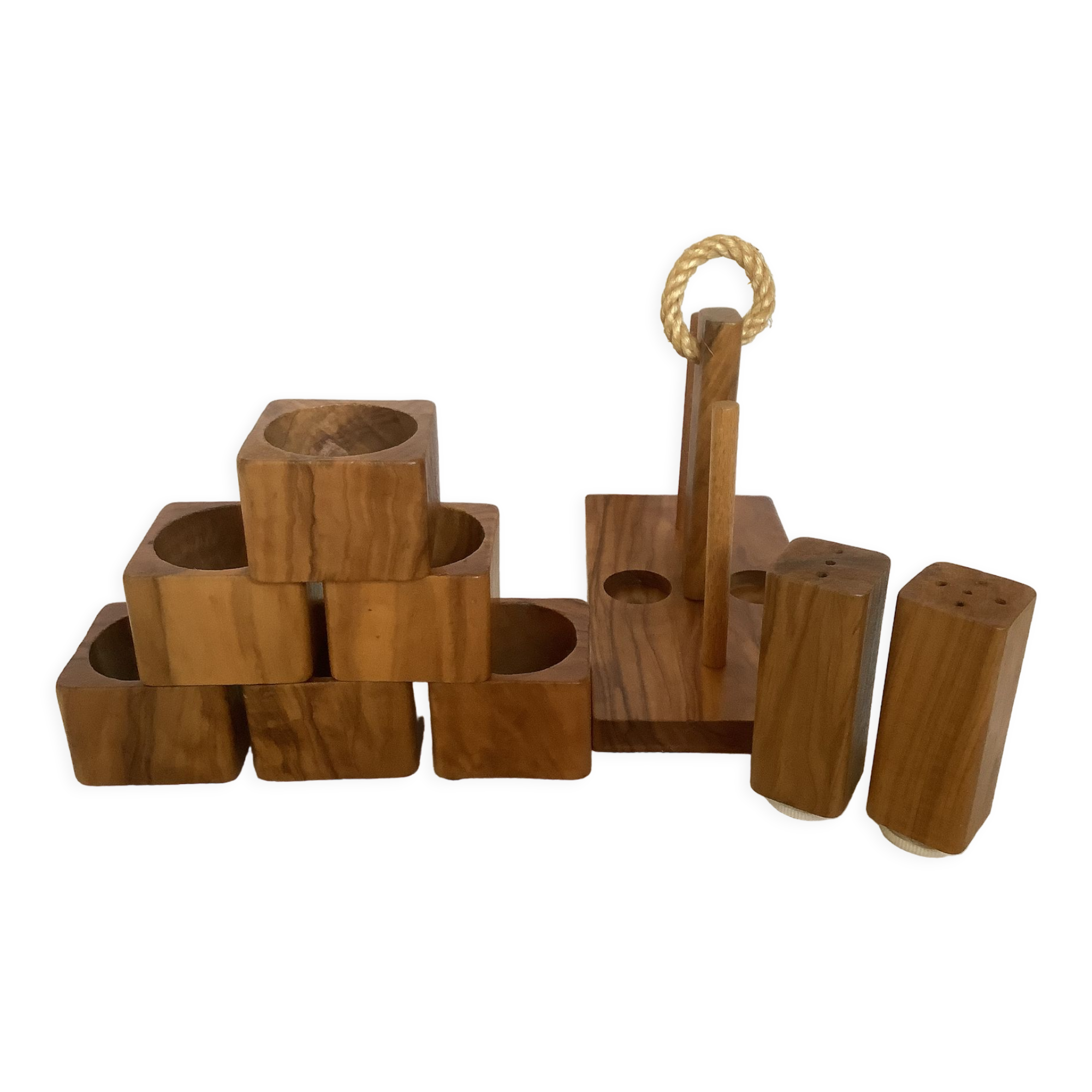 Six olive wood salt and pepper egg cups with their holder.