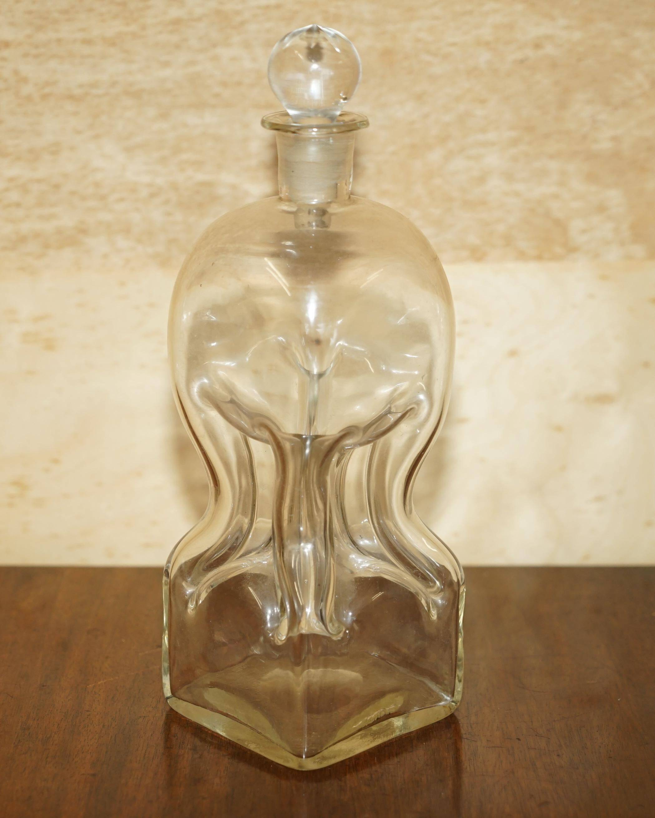 Pair of antique pinched decanters circa 1900 for serving whisky, bourbon, vodka, gin.