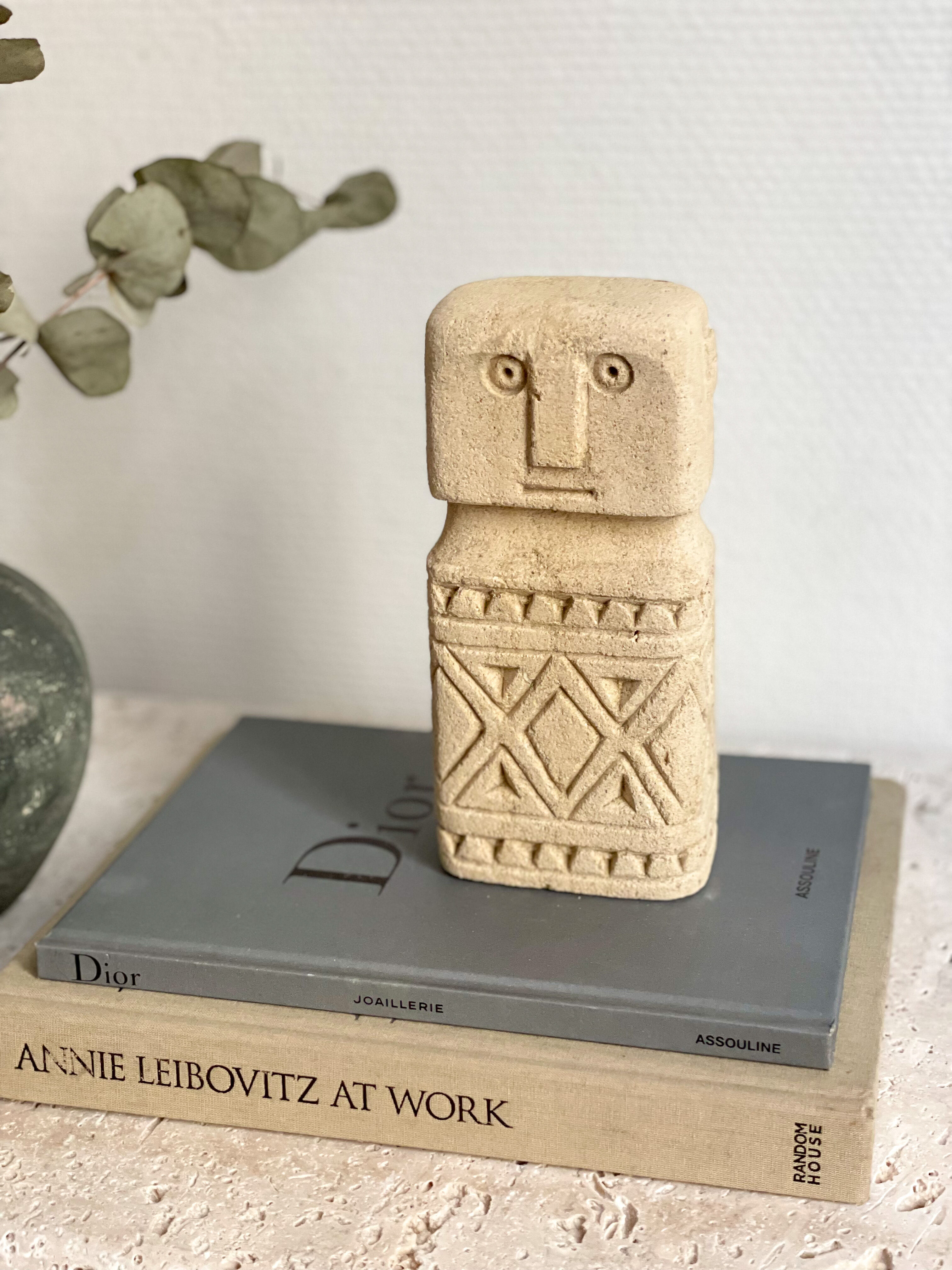 minimalist stone faces