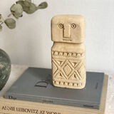 minimalist stone faces