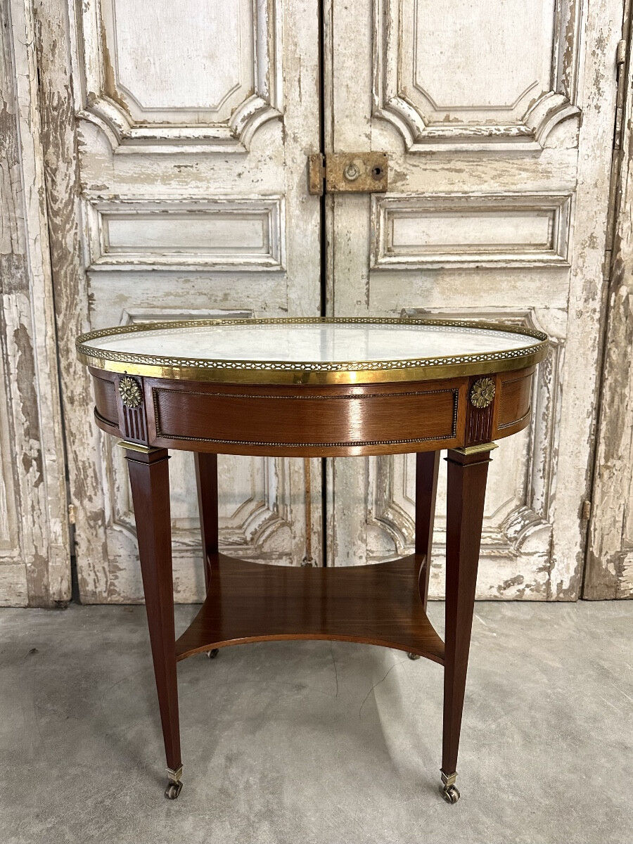 Small salon table in Directoire style, 20th century.
